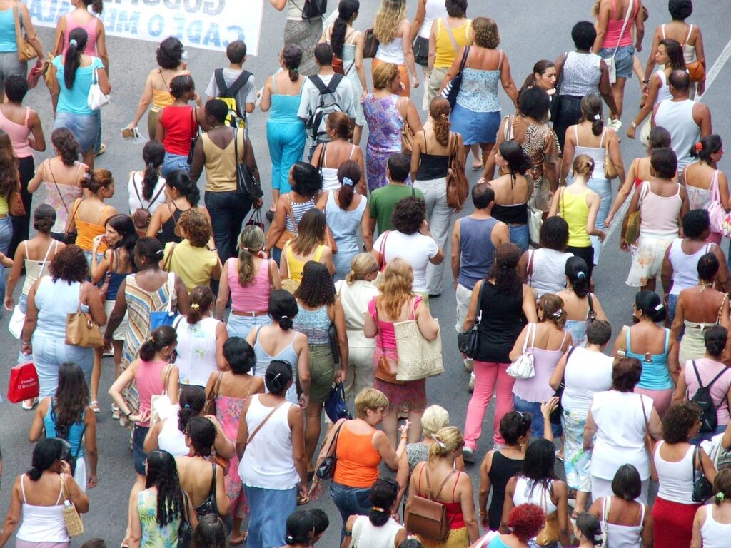 large, city, crowd, woman in middle