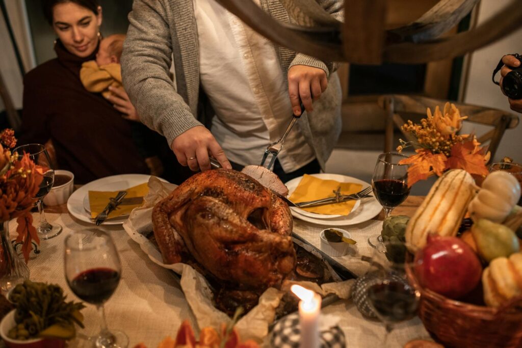 A Person Slicing Roasted Turkey-Grumble Gratitude