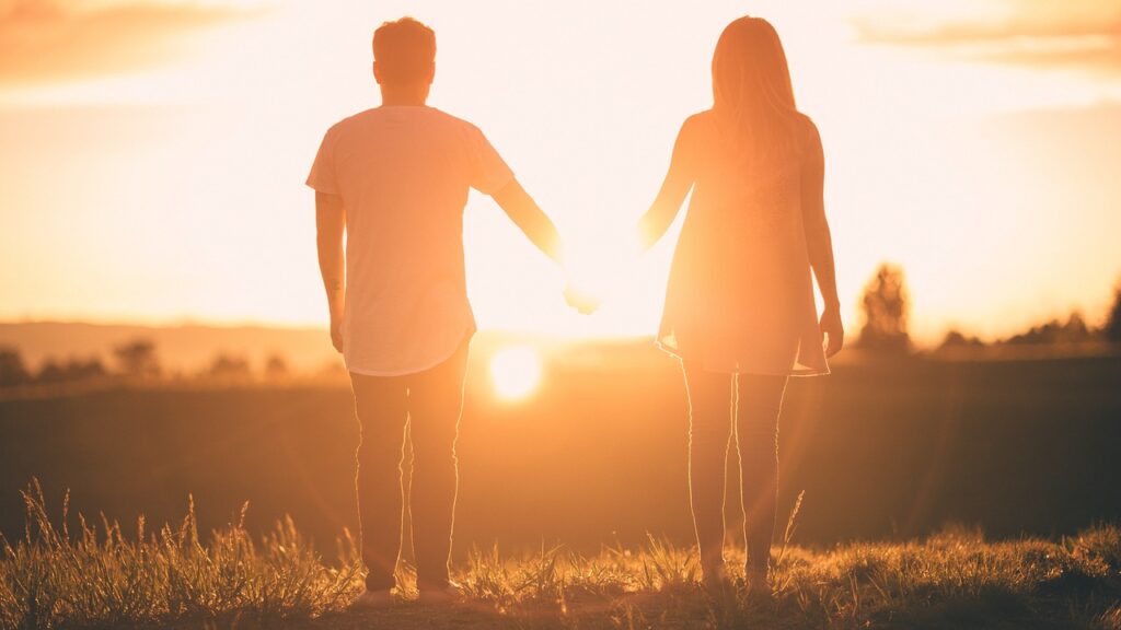 Portrait of Marriage background, people, holding hands, sunset, man, woman, landscape, outdoors, nature, sunlight, couple, together, relationship, lovers, silhouettes